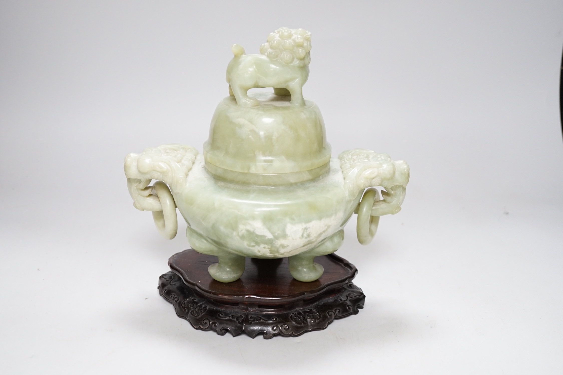 A large Chinese bowenite jade censer and cover on carved hardwood stand, 21cm wide